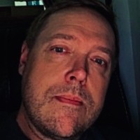 Travis M