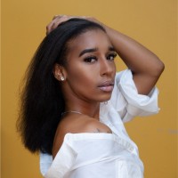 Kiona Thomas, She/Her/Hers