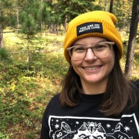 Nic Muñoz-Proulx (She/They)