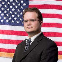 Nathan E.
