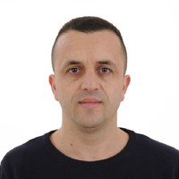 Shkelzen E Hasani