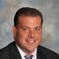 John M. Klusarits