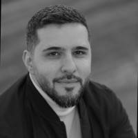 Iman E.