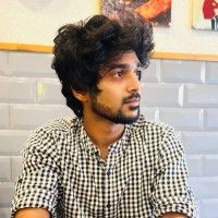 Charan R