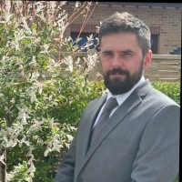 Damien Corlett- Oates