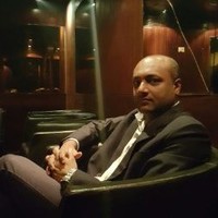 Mathew K Thomas