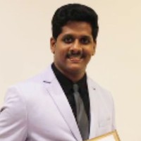 Dr Avinash B