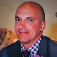 Brad E.