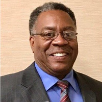 James E. Cooper, MHSM