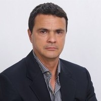 Carlos E Martinez