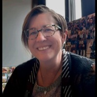 Angela Young, Comt