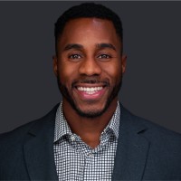 Travis E.