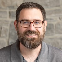 Travis May