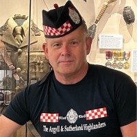 Mr Alan Thomas Carmichael MCGI CIWFM