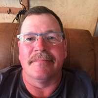 Tim Hughes