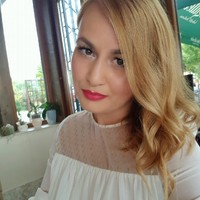 Laura M. Flesariu