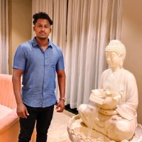 Madhan J