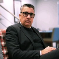 Pastor Don Carlo Reina