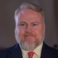 Dr Robert Barnes, Chartered FCSI(Hon)