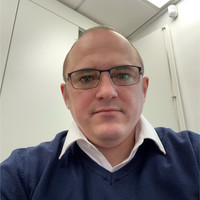 Chris Baker, FICS, MILT