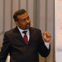 Dr. Nibu John Thomas
