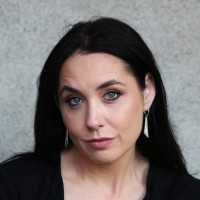 Grace K.