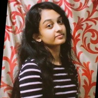 Aruna M