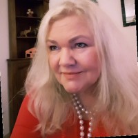 Corinne R.