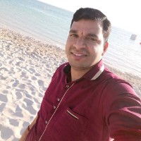 Purushothama P
