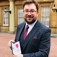 Jonathan Burton MBE FRPharmS