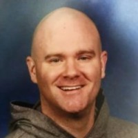 Stephen J McDade