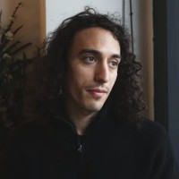 Adam A.