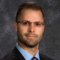 Dr. Raymond J. Schmidt