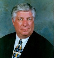 Robert E. Hamric. DMD, FAGD