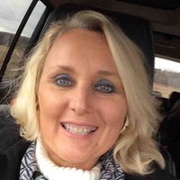 Gina M.
