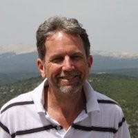 Simon Curry