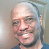 Michael Isimbabi, PhD