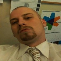 Tyler L. Curtis