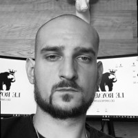 NIKOLAI M.