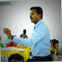 Shanmugam T