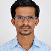 Vignesh T