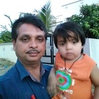 RAVIKUMAR R. TANDEL