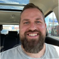Adam Koerber (He/Him)