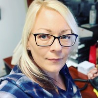 Kelli A