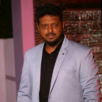 Nishar A