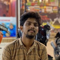Dinesh T