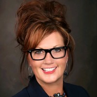 Tori J.E. Riley