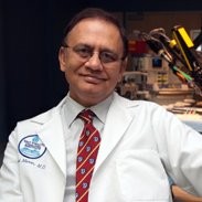 Dr Mani Menon