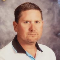 A. Travis Hall