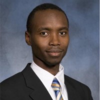 Alex Migambi, J.D,